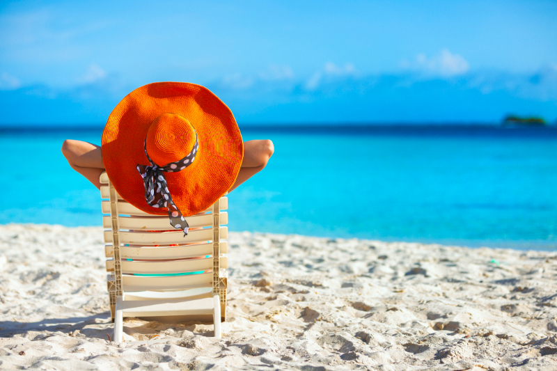 relaxed young woman with orange hat